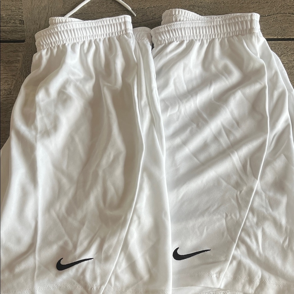 Nike White Athletic Shorts with Black Swoosh Pair